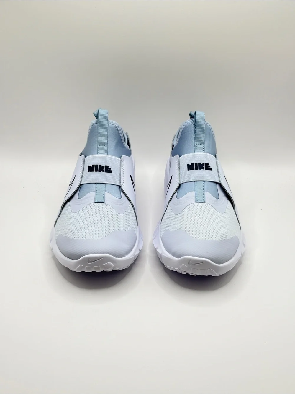Nike 6Y/7.5W Light Blue and White Slip-On Sneakers with Navy Swoosh